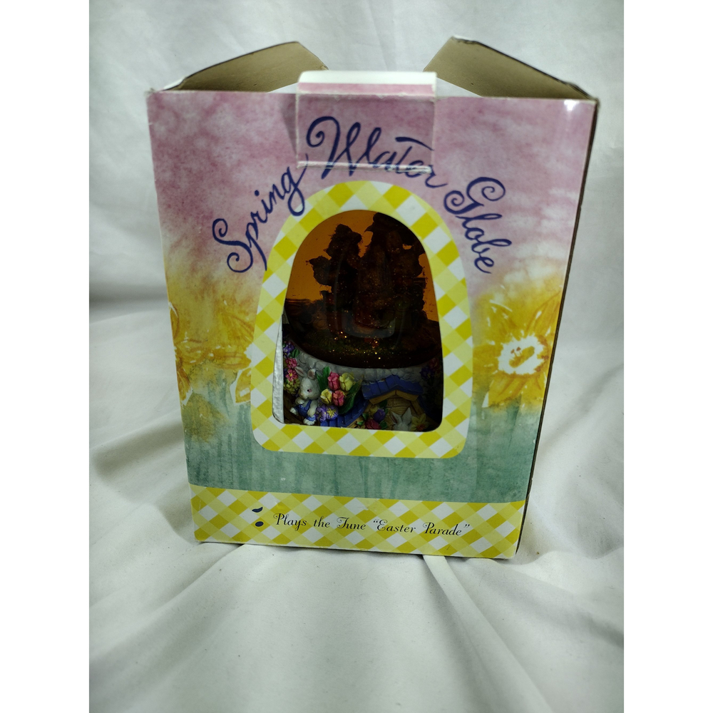 spring water globe plays "easter parade" music box still works